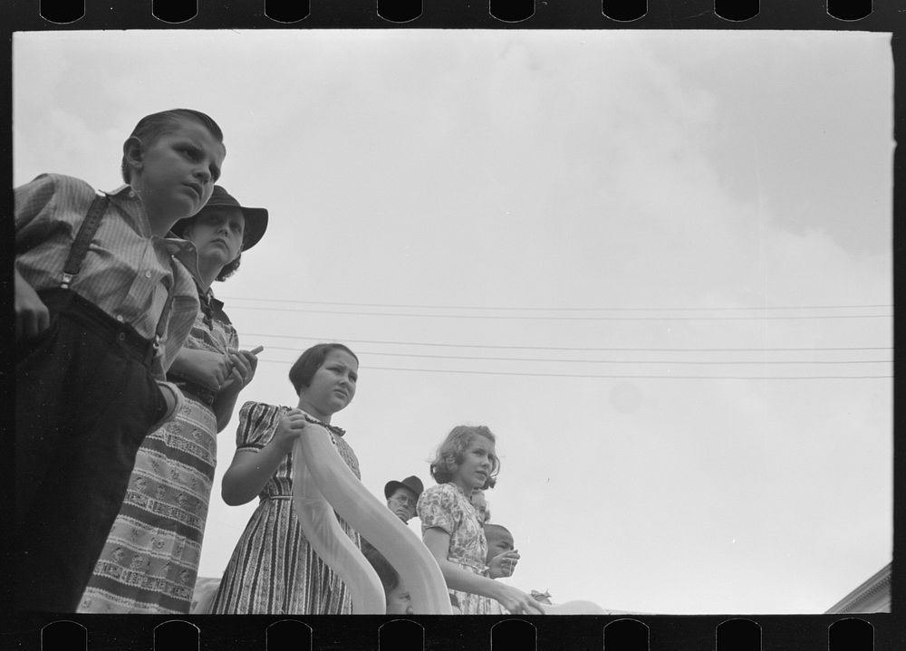 [Untitled photo, possibly related to: People waiting on sidewalk for parade, National Rice Festival, Crowley, Louisiana] by…