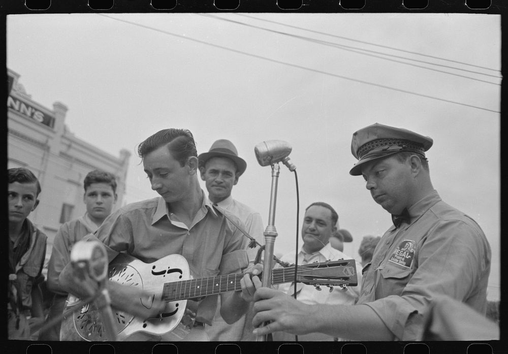 [Untitled photo, possibly related to: Cajun Hawaiian guitar player, National Rice Festival, Crowley, Louisiana] by Russell…