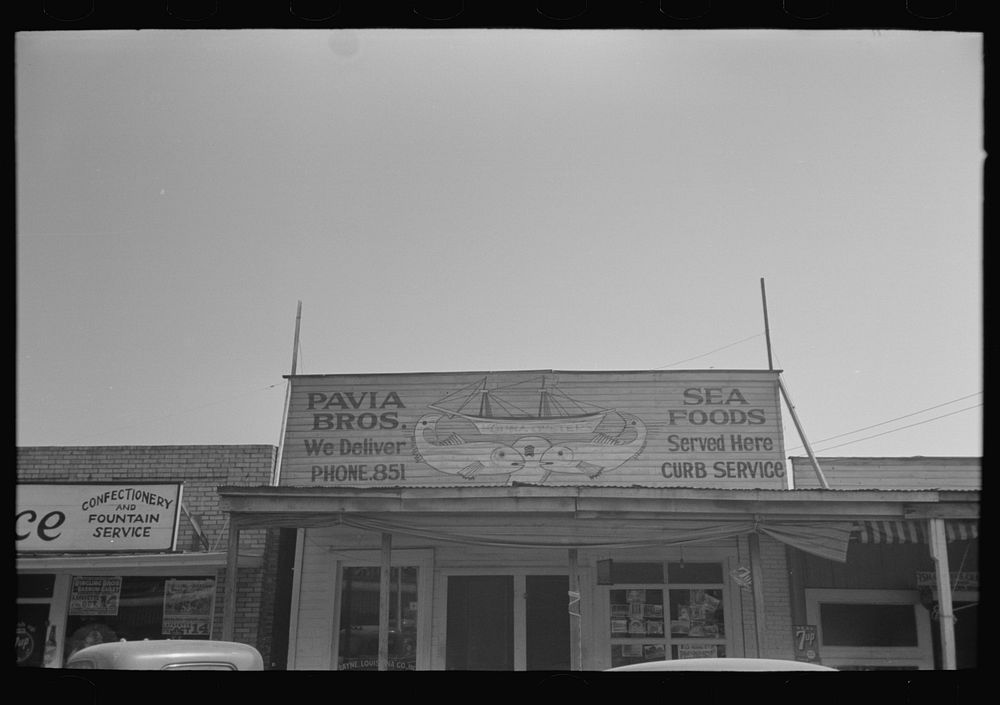 Storefront with seafood sign, Crowley, Louisiana by Russell Lee
