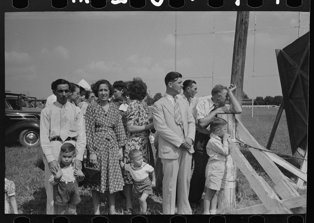 Group of people at state fair, Donaldsonville, Louisiana, watching ceremonies by Russell Lee
