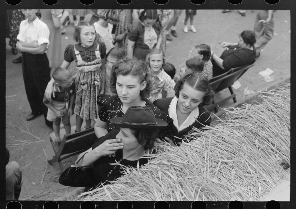 [Untitled photo, possibly related to: Detail of crowd listening to Cajun band contest, National Rice Festival, Crowley…