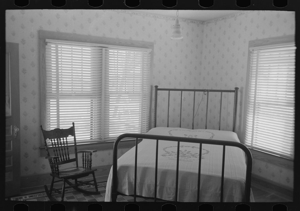 [Untitled photo, possibly related to: Bedroom of daughter of wealthy Cajun farmer, Jospeh La Blanc, near Crowley, Louisiana]…