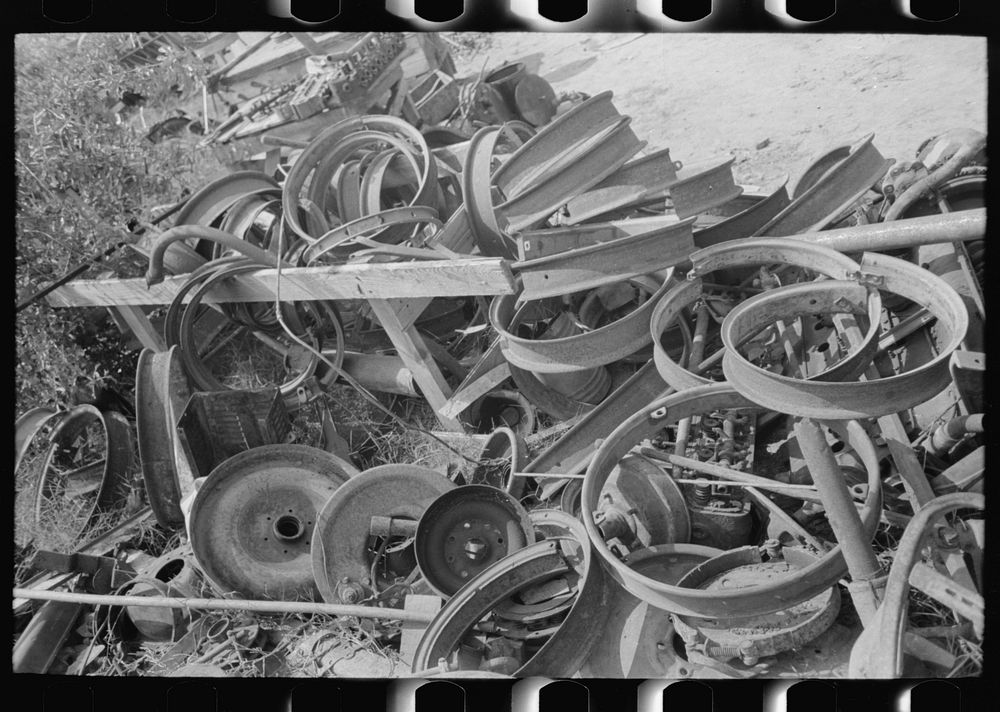 Tire rims at junkyard, Abbeville, Louisiana by Russell Lee