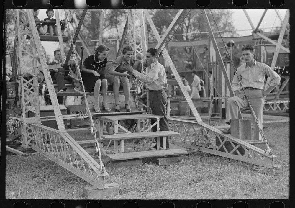 [Untitled photo, possibly related to: Crowd listening to barker at sideshow, state fair, Donaldsonville, Louisiana] by…