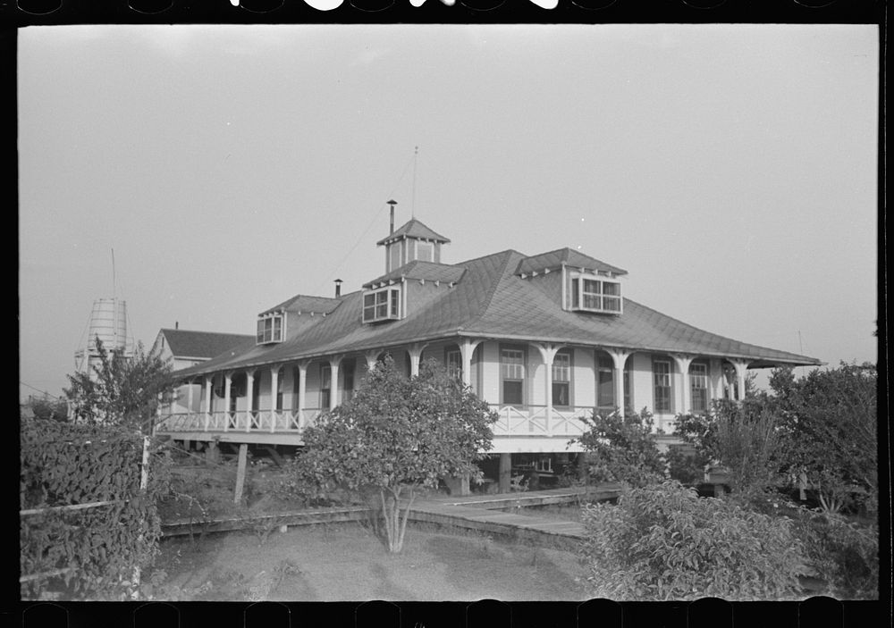 [Untitled photo, possibly related to: Pilottown, Louisiana, building and boardwalks] by Russell Lee
