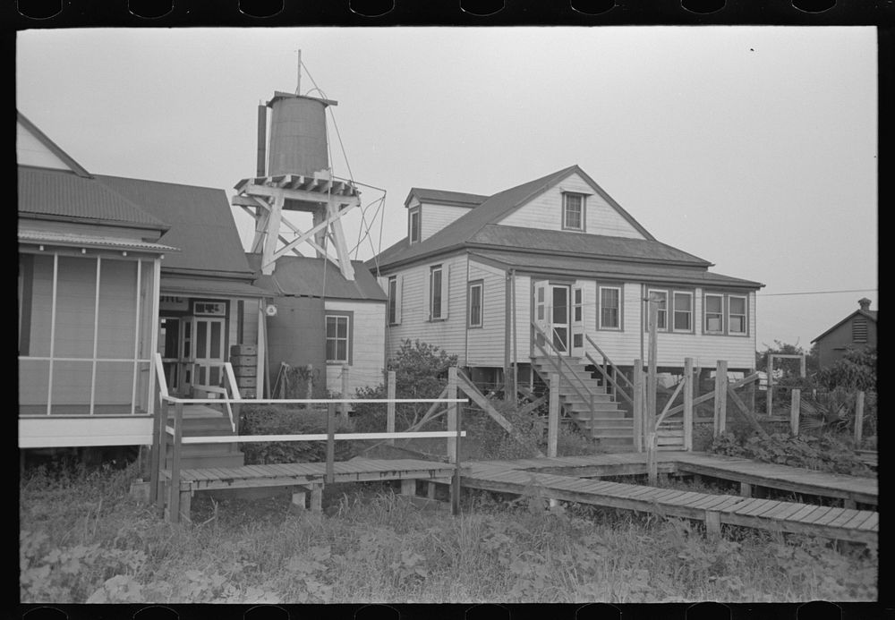 Pilottown, Louisiana, building and boardwalks by Russell Lee