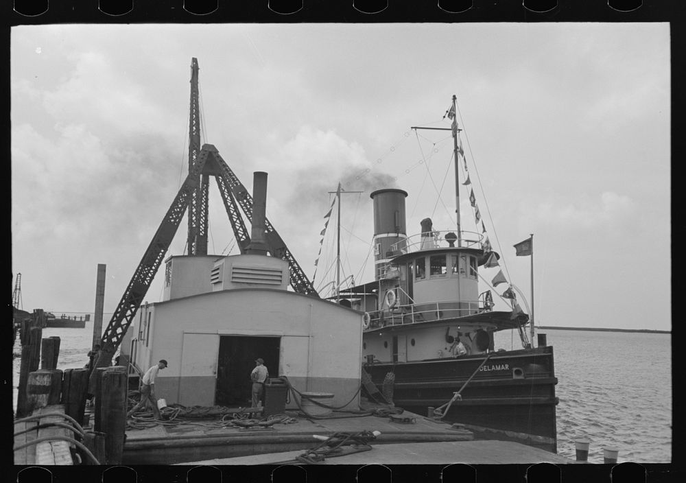 [Untitled photo, possibly related to: U.S. Engineers' tugboat, Burrwood, Louisiana] by Russell Lee