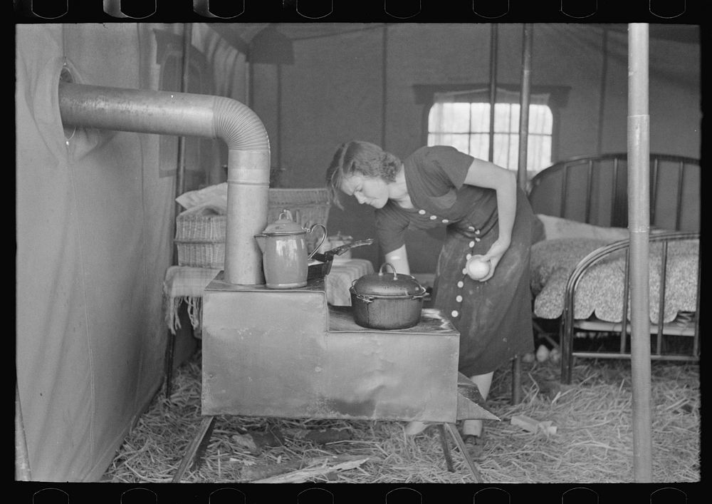 Tent of migrant stove maker and repairer on U.S. 90 near Jeanerette, Louisiana by Russell Lee