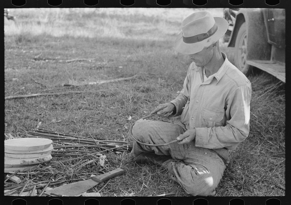 [Untitled photo, possibly related to: Migrant cane chair maker on U.S. 90 near Jeanerette, Louisiana] by Russell Lee