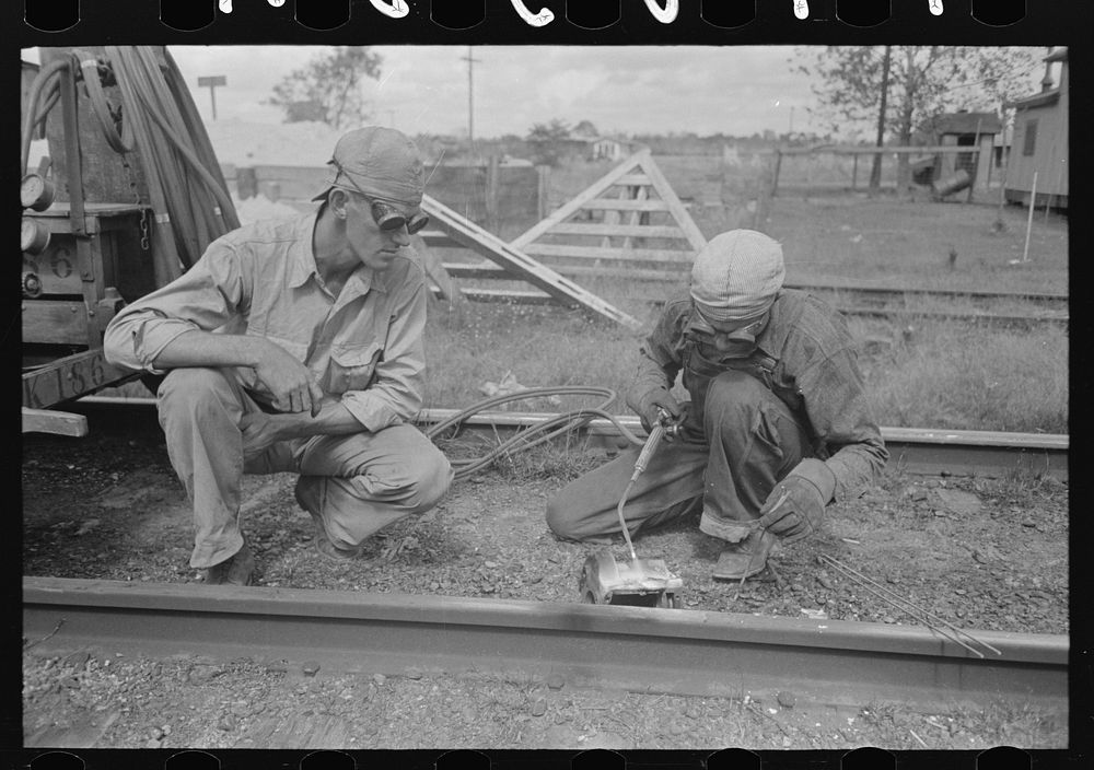 [Untitled photo, possibly related to: Welding a rail near Port Barre, Louisiana] by Russell Lee