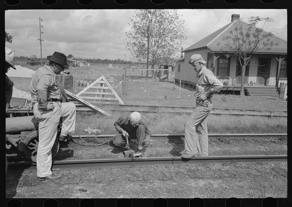 [Untitled photo, possibly related to: Welding a rail near Port Barre, Louisiana] by Russell Lee
