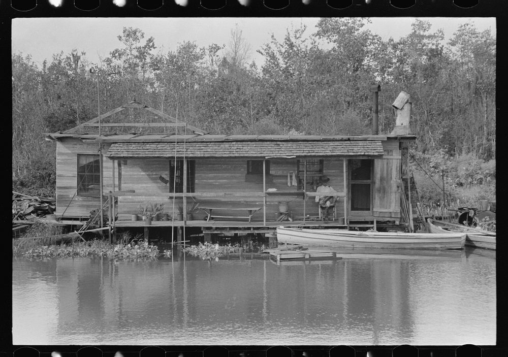 Fisherman's home along the Bayou, Akers, Louisiana by Russell Lee