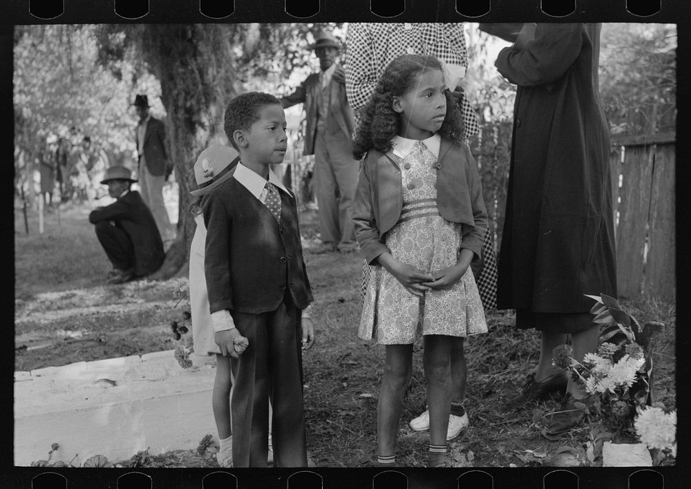 Children dressed in Sunday best for ceremonies, memorial services. All Saint's Day, New Roads, Louisiana by Russell Lee