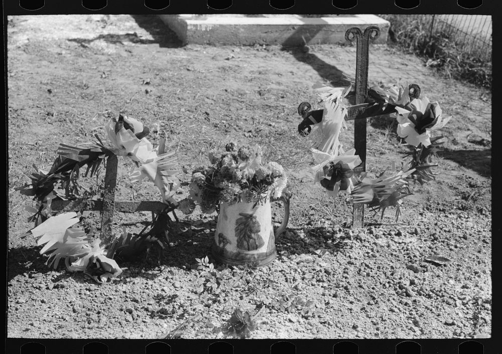[Untitled photo, possibly related to: Decorated graves in cemetery on All Saints' Day at New Roads, Louisiana] by Russell Lee