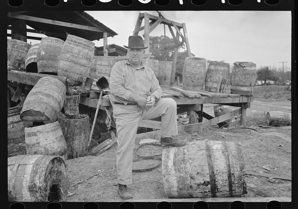 Owner in front of his turpentine still, State Line, Mississippi by Russell Lee