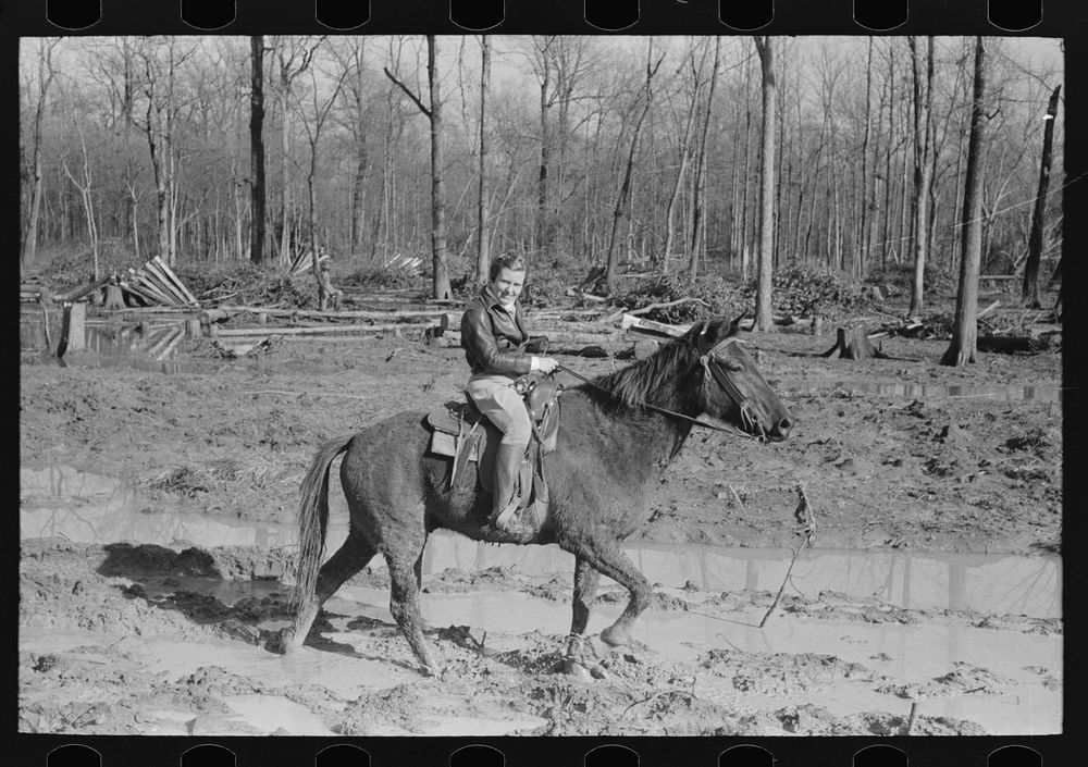 Home supervisor of Chicot Farms project must ride horseback to get to and from project. Arkansas by Russell Lee