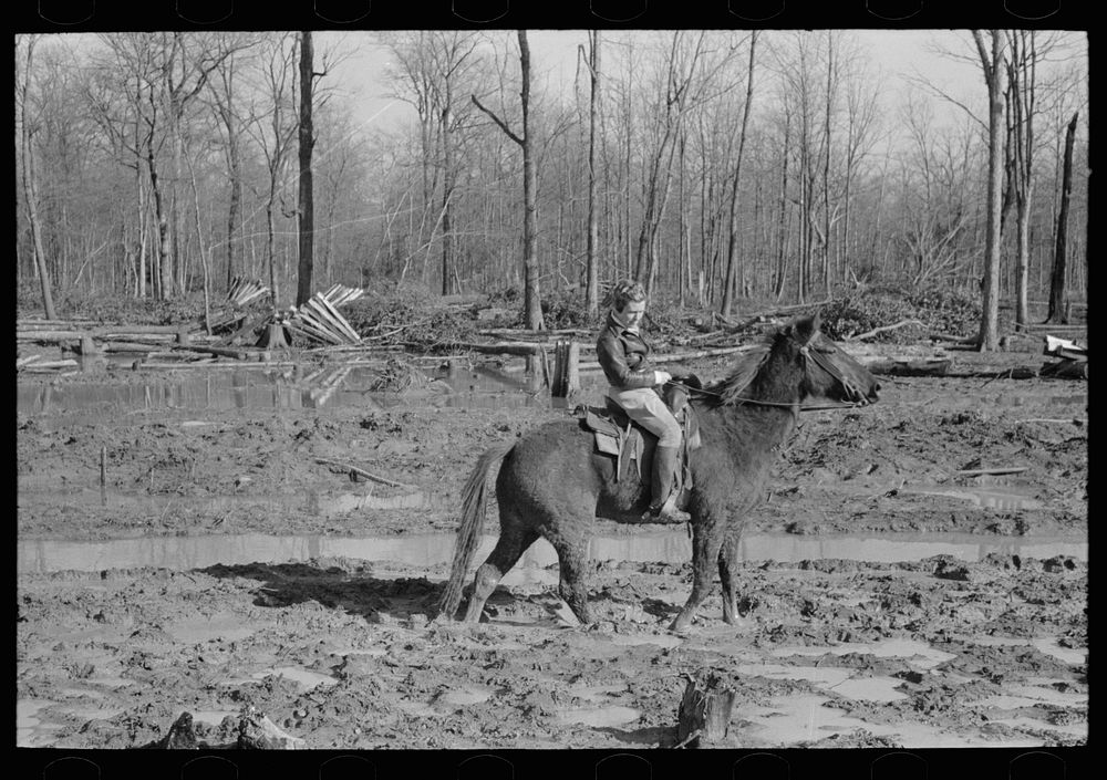 [Untitled photo, possibly related to: Home supervisor of Chicot Farms project must ride horseback to get to and from…