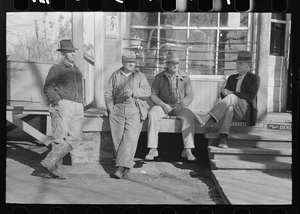 Men in front of general store, Jerome, Arkansas by Russell Lee