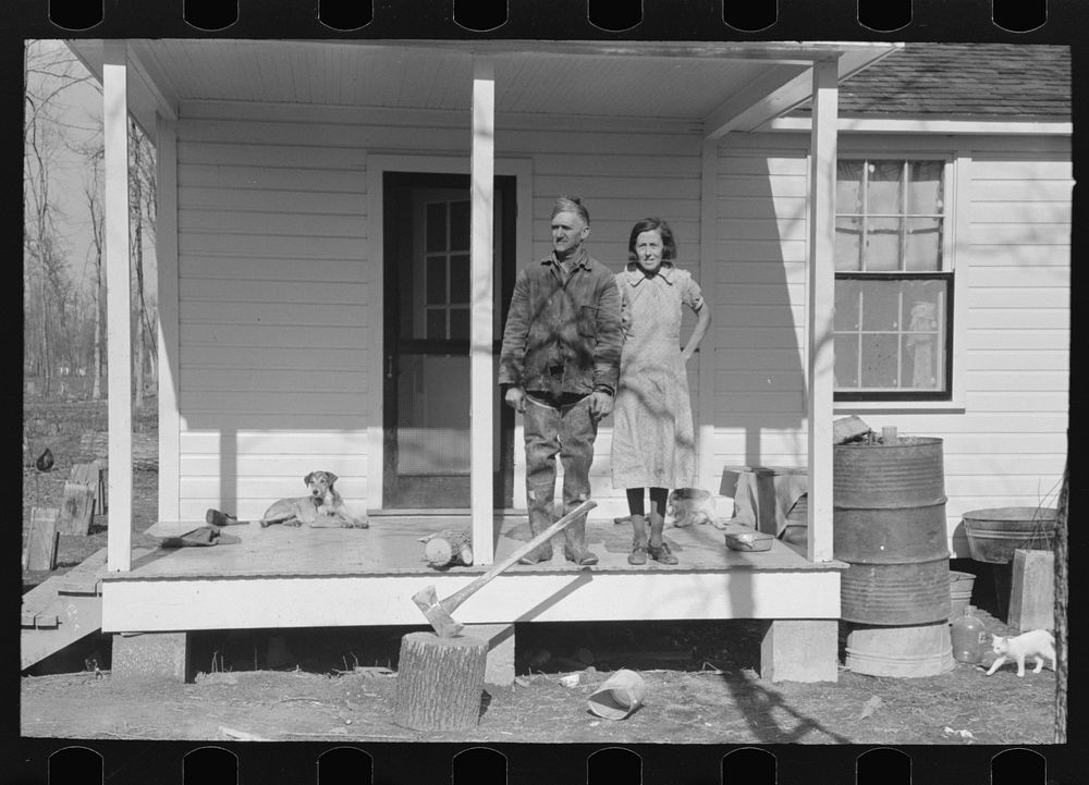 Husband and wife on porch of home, Chicot Farms, Arkansas by Russell Lee