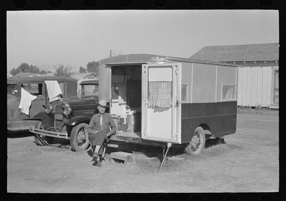 Former cowboy living in trailer home in midst of migrant camp, Weslaco, Texas. He has independent income and travels around…