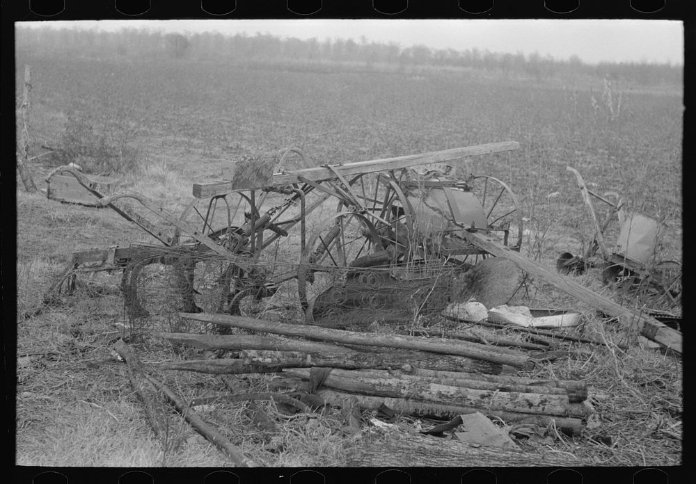 Because of lack of storage space it is necessary to keep agricultural implements in the open. Sharecropper farm near Pace…
