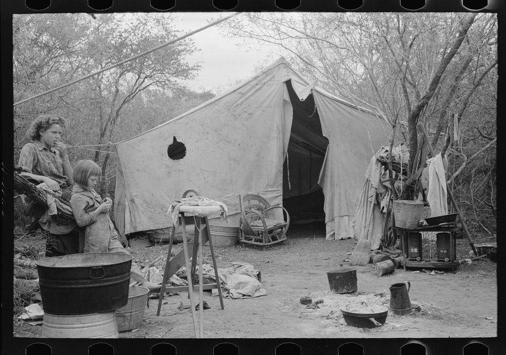 Tent home of white migrant from Arizona, near Harlingen, Texas by Russell Lee