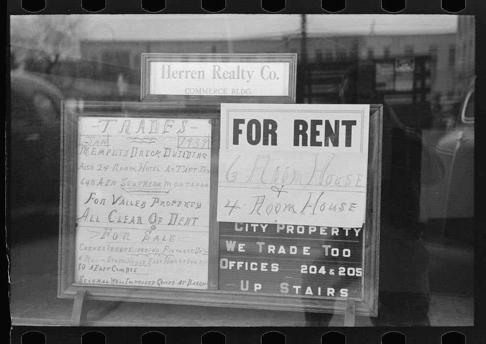 Signs in real estate window, Harlingen, Texas by Russell Lee