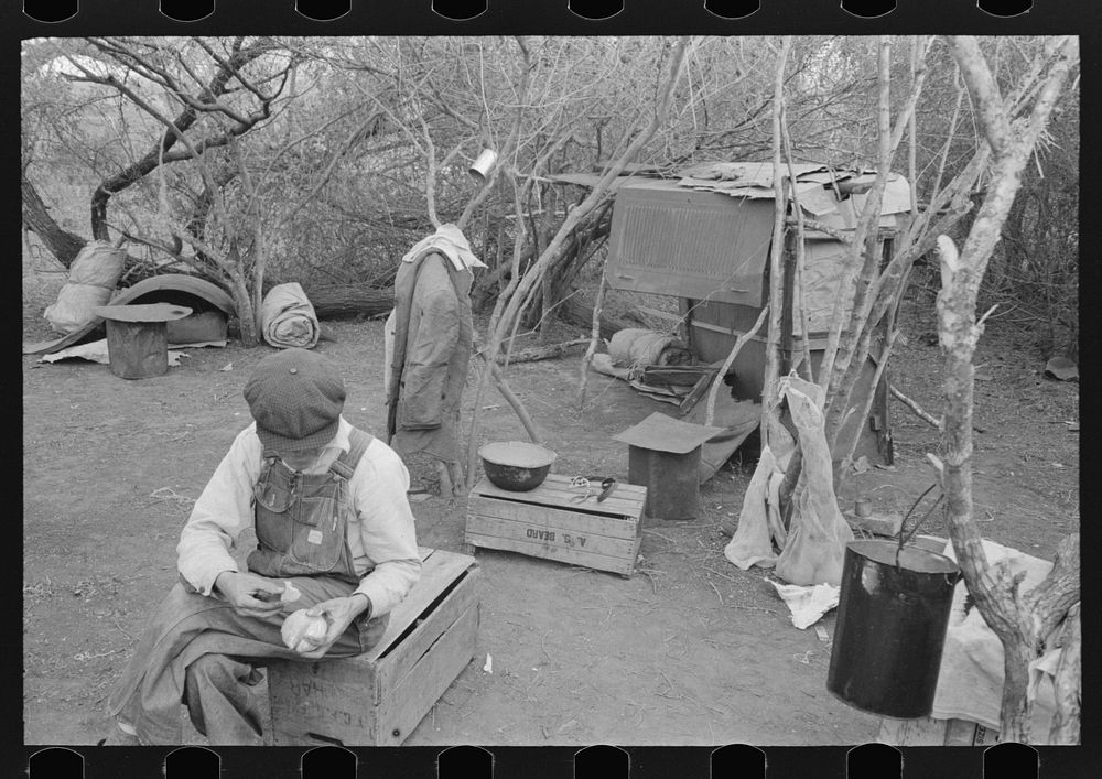 [Untitled photo, possibly related to: White migrant worker living in camp with two other migrant men. His sleeping quarters…