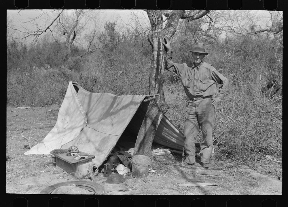 Migrant man encamped in the mesquite north of Harlingen, Texas by Russell Lee