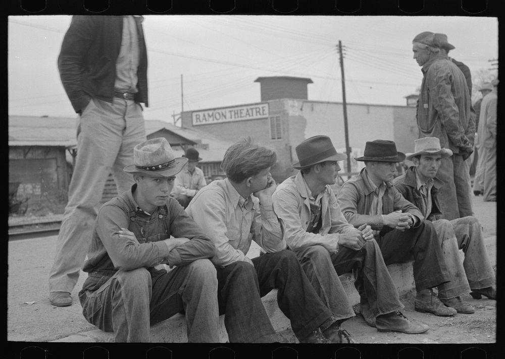 Day laborers waiting along railroad tracks for possible employment, Raymondville, Texas by Russell Lee