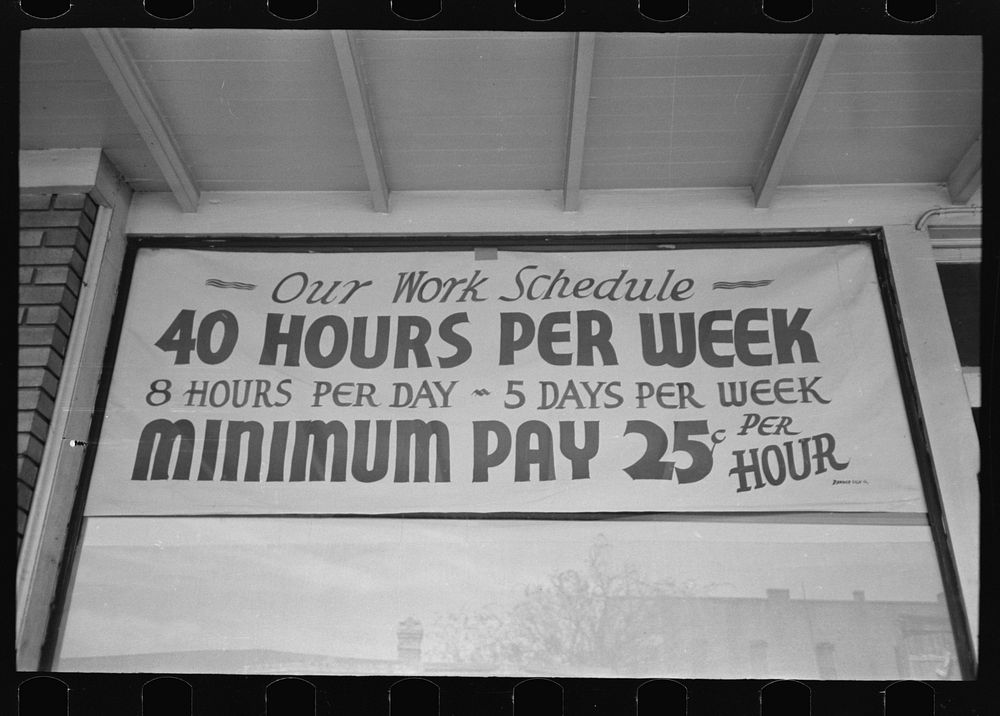 Sign in front of baby clothes manufacturers, San Antonio, Texas by Russell Lee