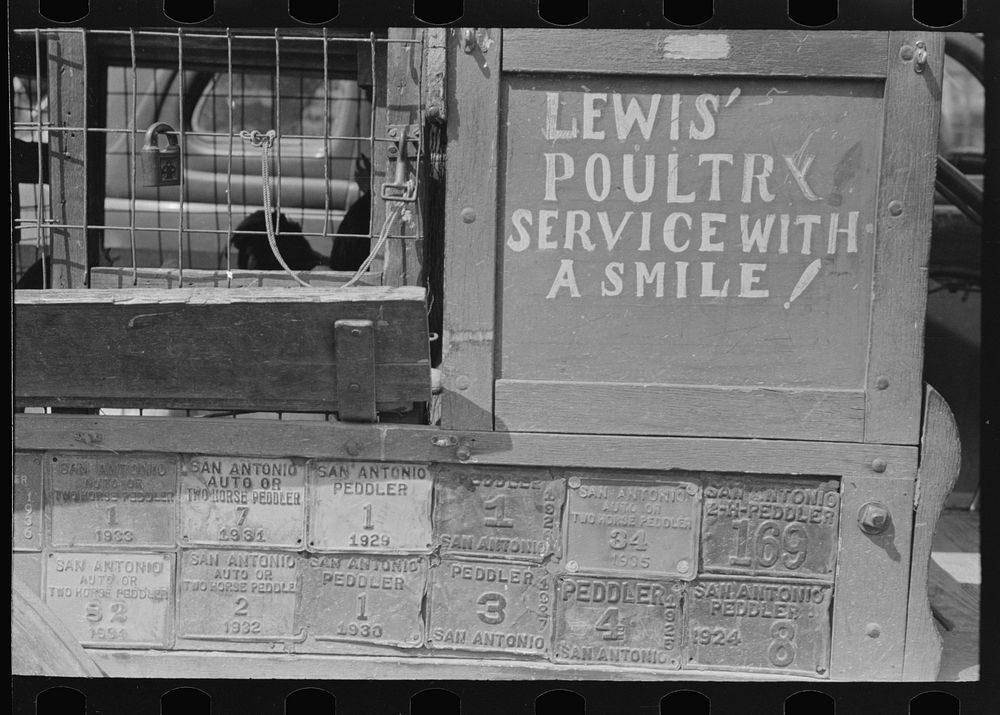 Peddler's licenses on poultry truck, market, San Antonio, Texas by Russell Lee