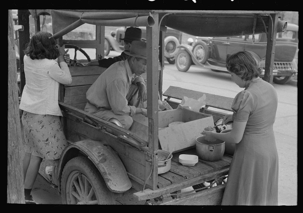 Mexican lunch wagon serving tortillas and fried beans to workers in pecan shelling plant, San Antonio, Texas by Russell Lee