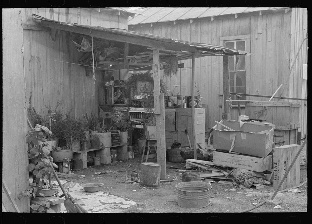 Household goods in backyard of Mexican house, San Antonio, Texas by Russell Lee