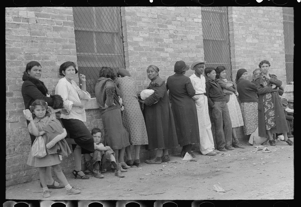 [Untitled photo, possibly related to: Crowd of people waiting at WPA clothing department, San Antonio, Texas] by Russell Lee
