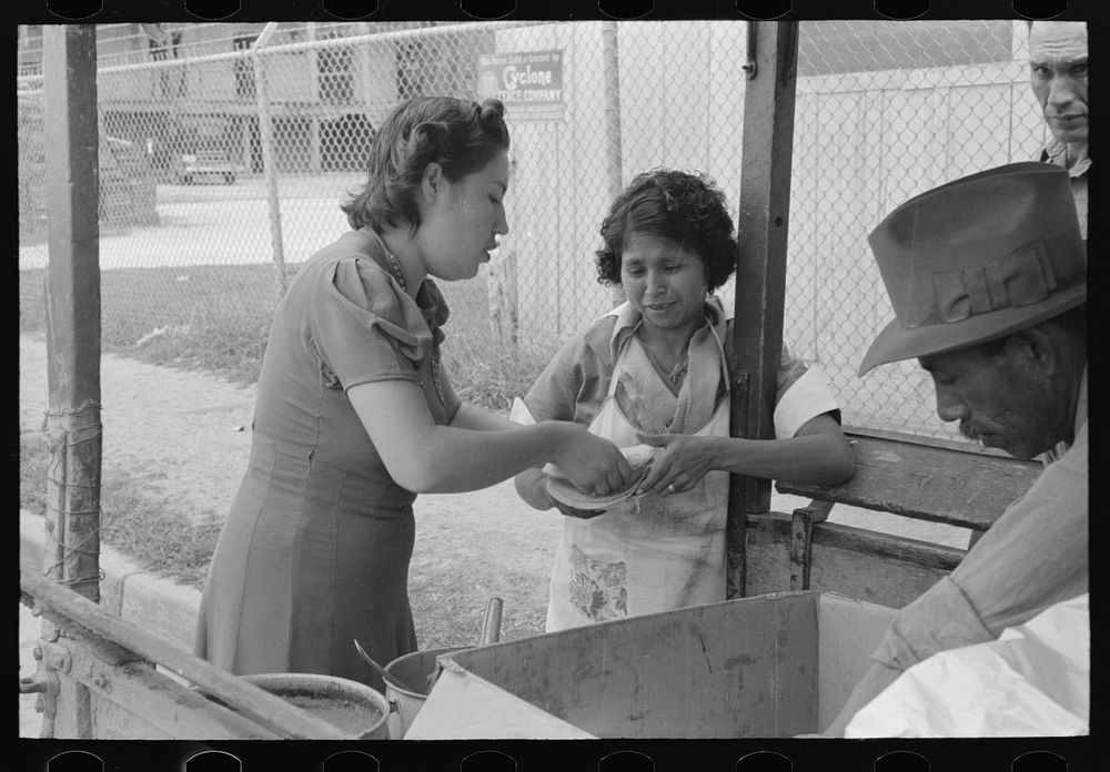[Untitled photo, possibly related to: Pecan sheller buying fried beans for her lunch, San Antonio, Texas] by Russell Lee