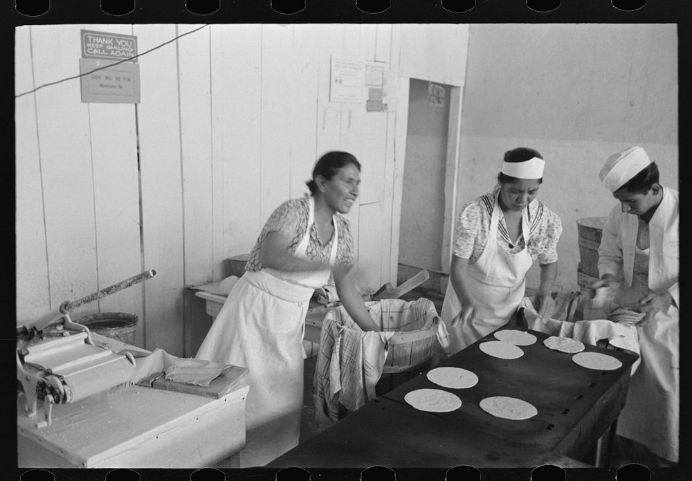 [Untitled photo, possibly related to: Making tortillas in bake shop, San Antonio, Texas. Tortillas are made of corn flour…