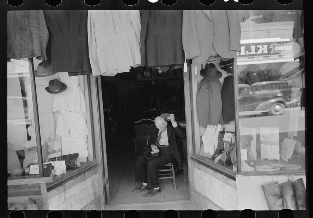 [Untitled photo, possibly related to: Mexicans looking at suits for sale, San Antonio, Texas] by Russell Lee