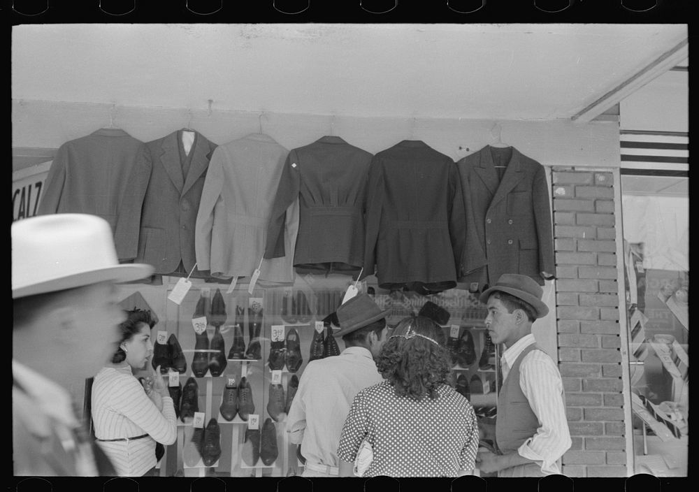 Mexicans looking at suits for sale, San Antonio, Texas by Russell Lee