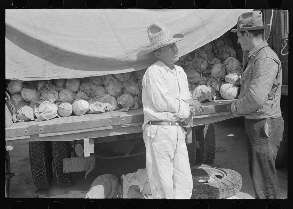 [Untitled photo, possibly related to: Vegetable peddlers in open air market, San Antonio, Texas] by Russell Lee
