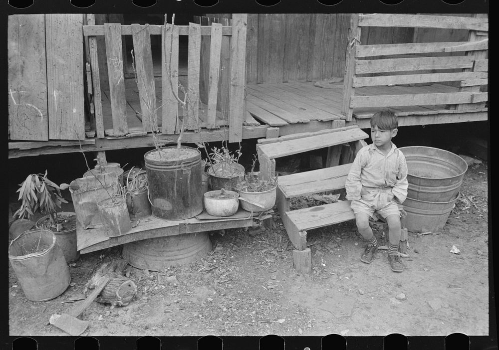 Mexican boy sitting on door step, San Antonio, Texas by Russell Lee