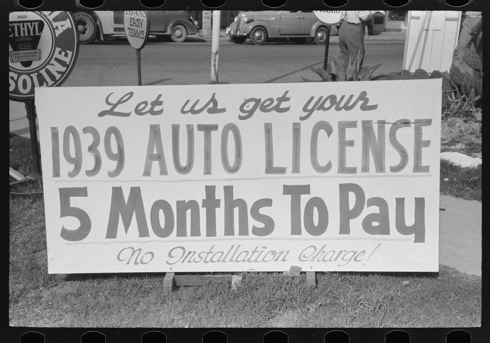 Auto license in Texas can be bought on the installment plan, San Antonio, Texas by Russell Lee