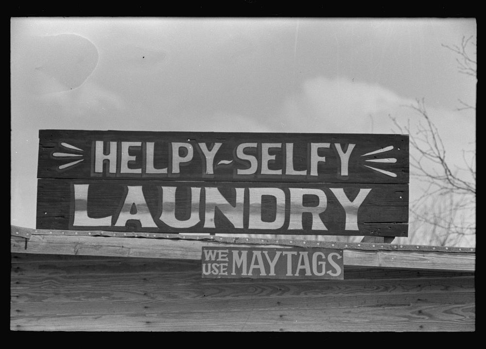 Sign, Quemado, Texas: Helpy-Selfy Laundry--We Use Maytags by Russell Lee