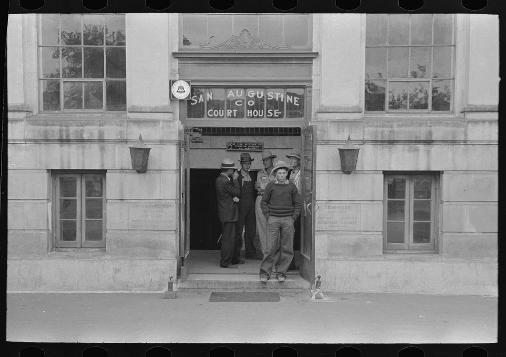 [Untitled photo, possibly related to: Group of men on the courthouse square, San Augustine, Texas] by Russell Lee