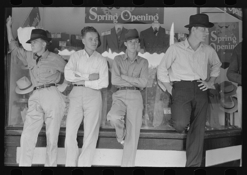 The younger generation in front of clothing store, San Augustine, Texas by Russell Lee