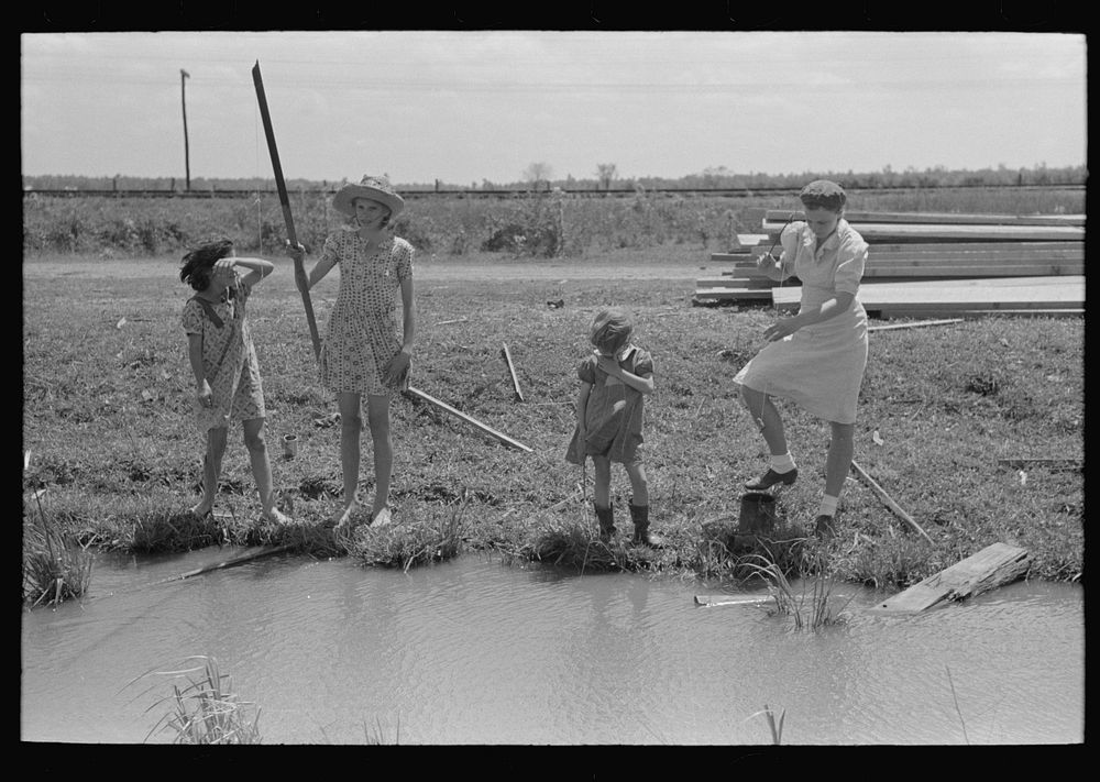 [Untitled photo, possibly related to: Fishing for crawfish, Opelousas, Louisiana] by Russell Lee