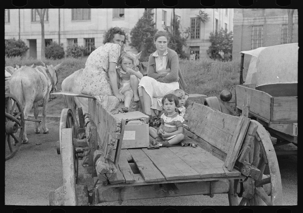 [Untitled photo, possibly related to: Farmer's family in town, Saturday afternoon, San Augustine, Texas] by Russell Lee