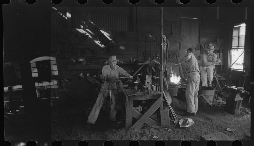[Untitled photo, possibly related to: Blacksmith shop, San Augustine, Texas] by Russell Lee