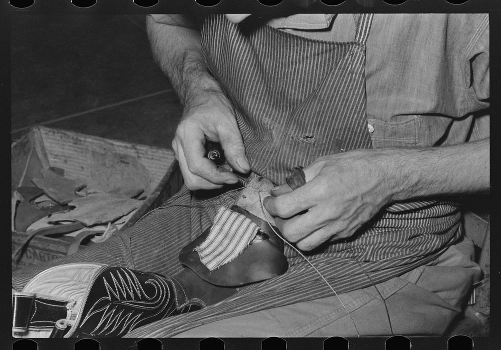 Sewing cap into toe of boot. Cowboy bootmaking shop, Alpine, Texas by Russell Lee