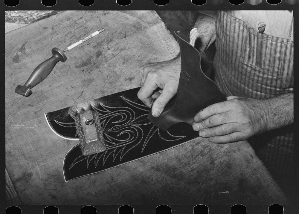 [Untitled photo, possibly related to: Fitting upper to lower part of boot. Bootmaking shop, Alpine, Texas] by Russell Lee